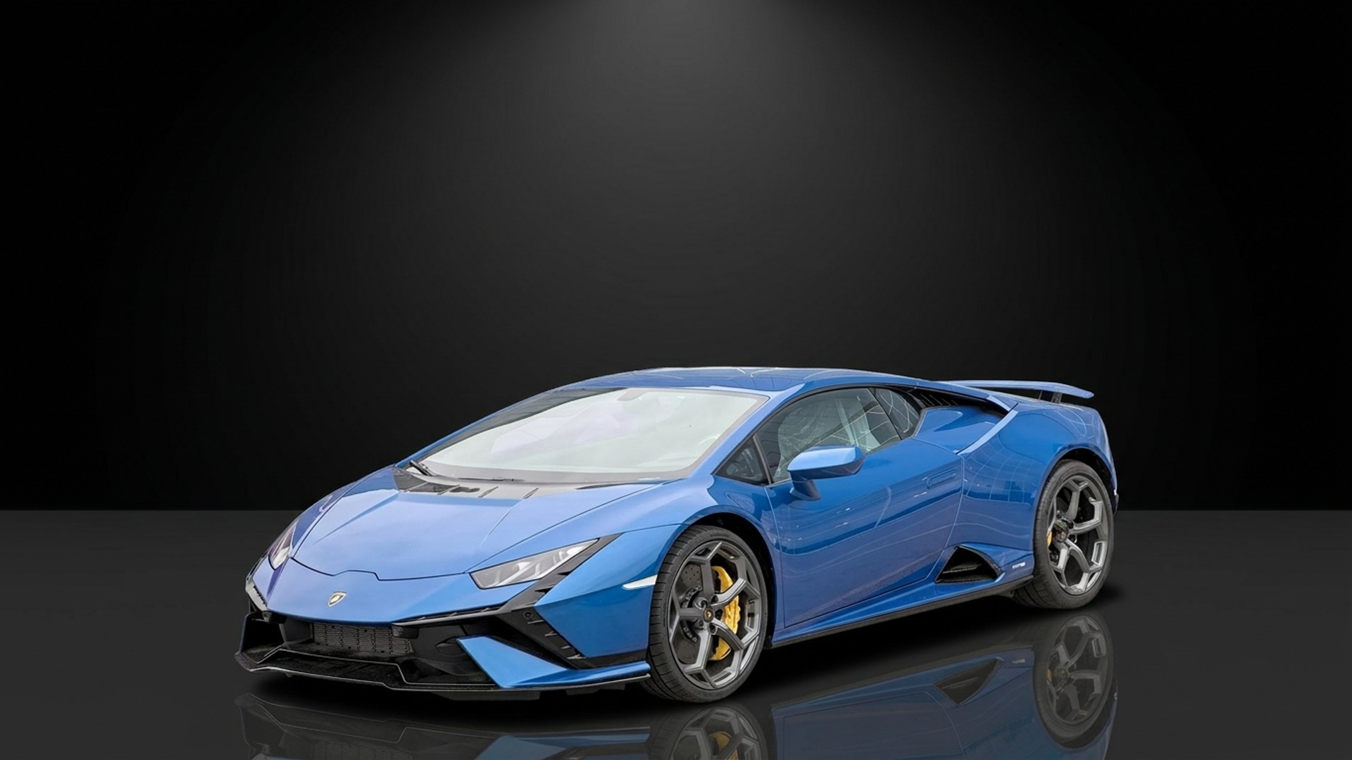 Lamborghini Huracán after AI background replacement — dark studio